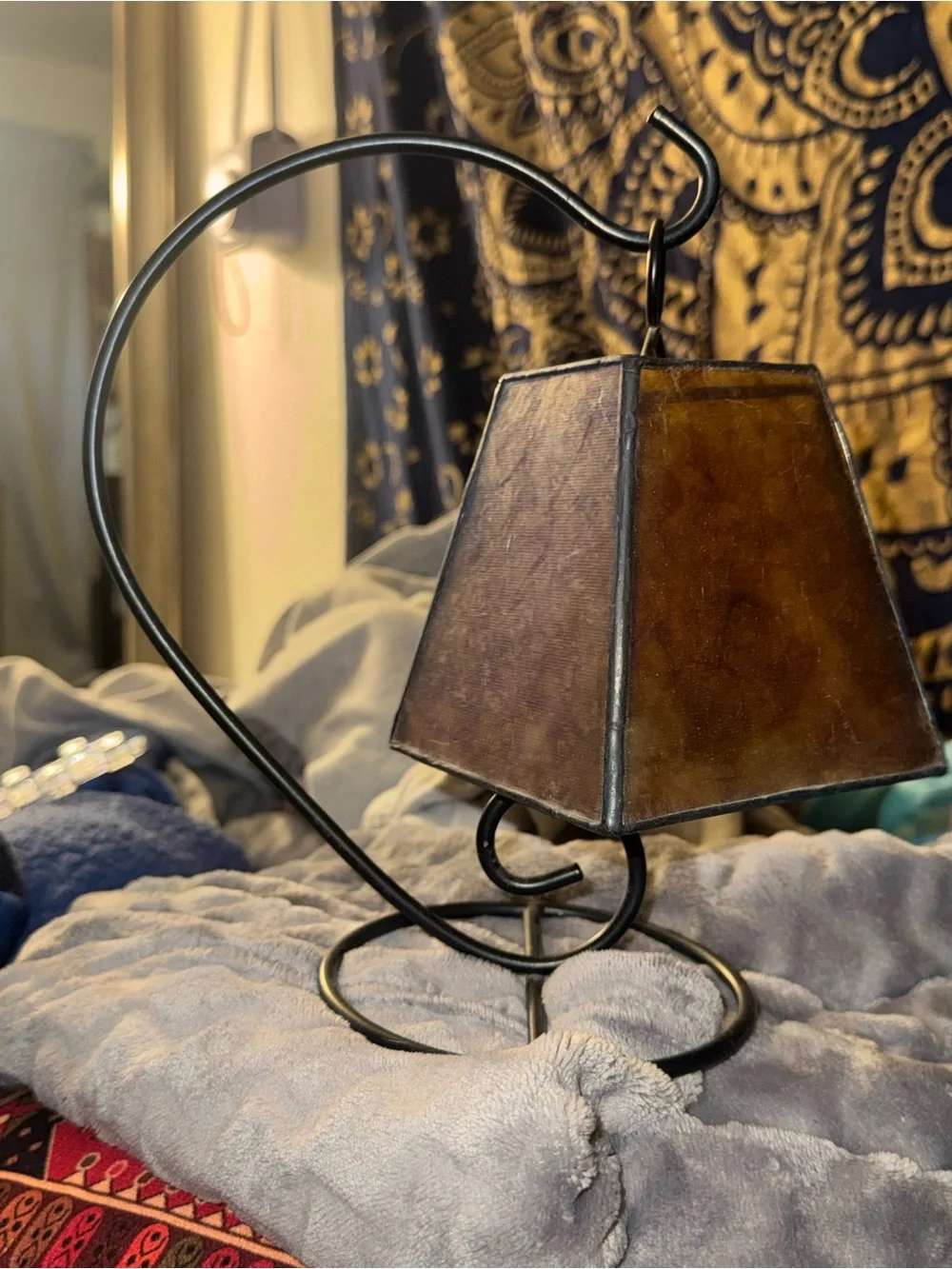 Hanging Lantern on Curved Black Metal Stand